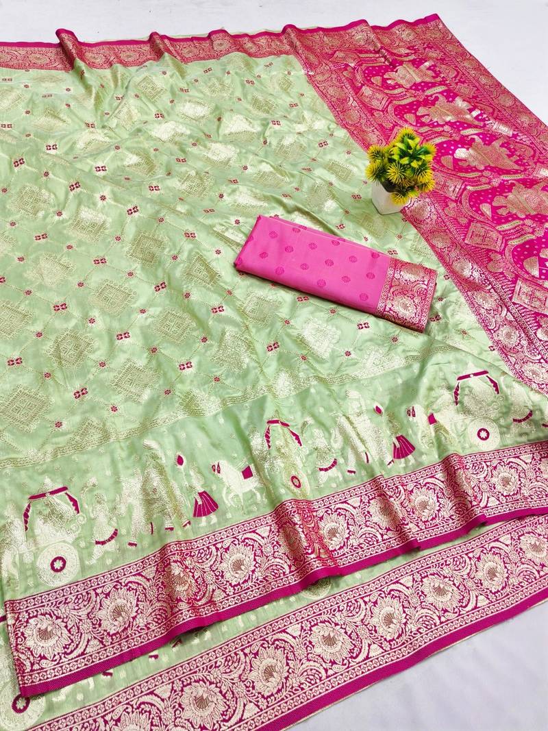 Light green zari woven banarasi silk blend saree with blouse piece