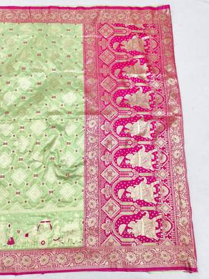 Light green zari woven silk blend saree with blouse piece 2