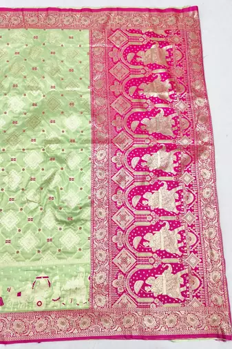 Light green zari woven silk blend saree with blouse piece