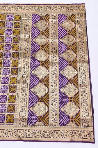 Wine zari woven silk blend saree with blouse piece