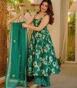Green color muslin printed ceremonial readymade attire