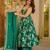 Green color muslin printed ceremonial readymade attire