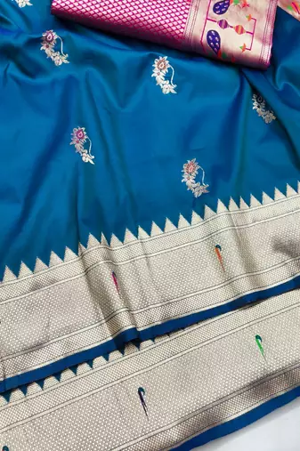 Blue zari woven paithani silk blend saree with blouse piece
