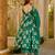 Green color muslin printed ceremonial readymade attire