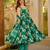 Green color muslin printed ceremonial readymade attire