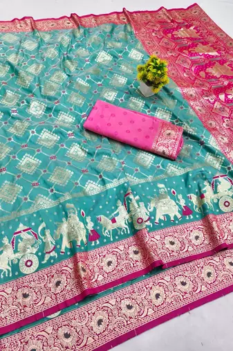 Light blue zari woven banarasi silk blend saree with blouse piece