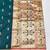 Firozi zari woven paithani silk blend saree with blouse piece