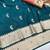 Firozi zari woven paithani silk blend saree with blouse piece
