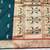 Firozi zari woven paithani silk blend saree with blouse piece