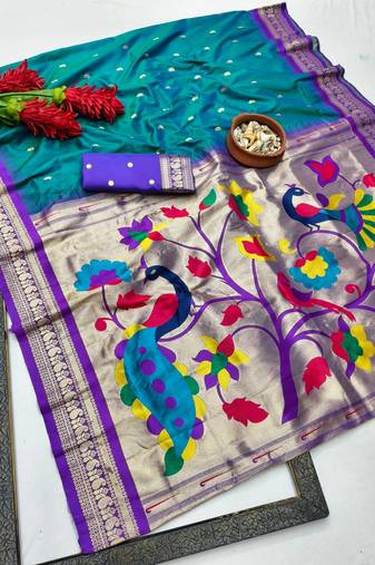 Teal zari woven paithani silk blend saree with blouse piece