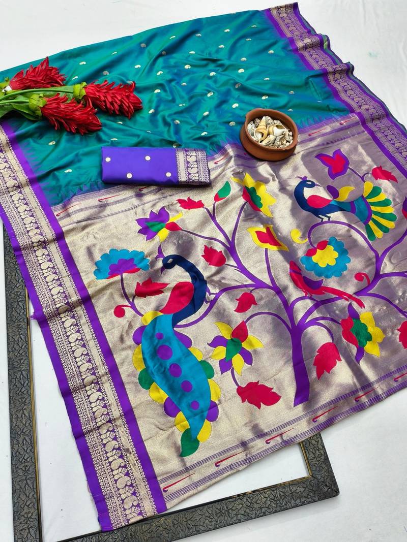 Teal zari woven paithani silk blend saree with blouse piece