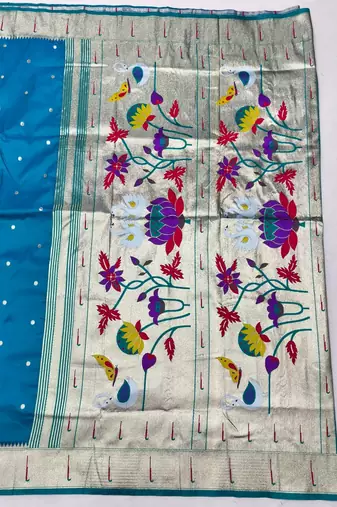 Blue zari woven paithani silk blend saree with blouse piece