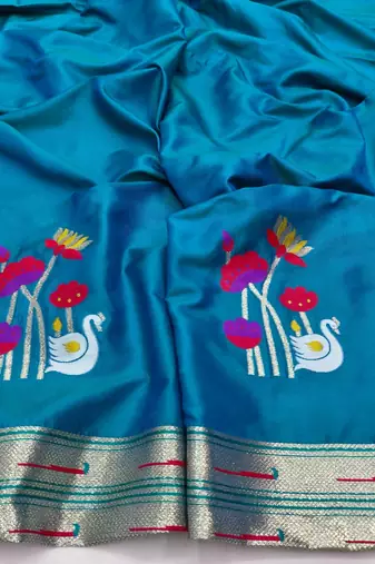 Blue zari woven paithani silk blend saree with blouse piece