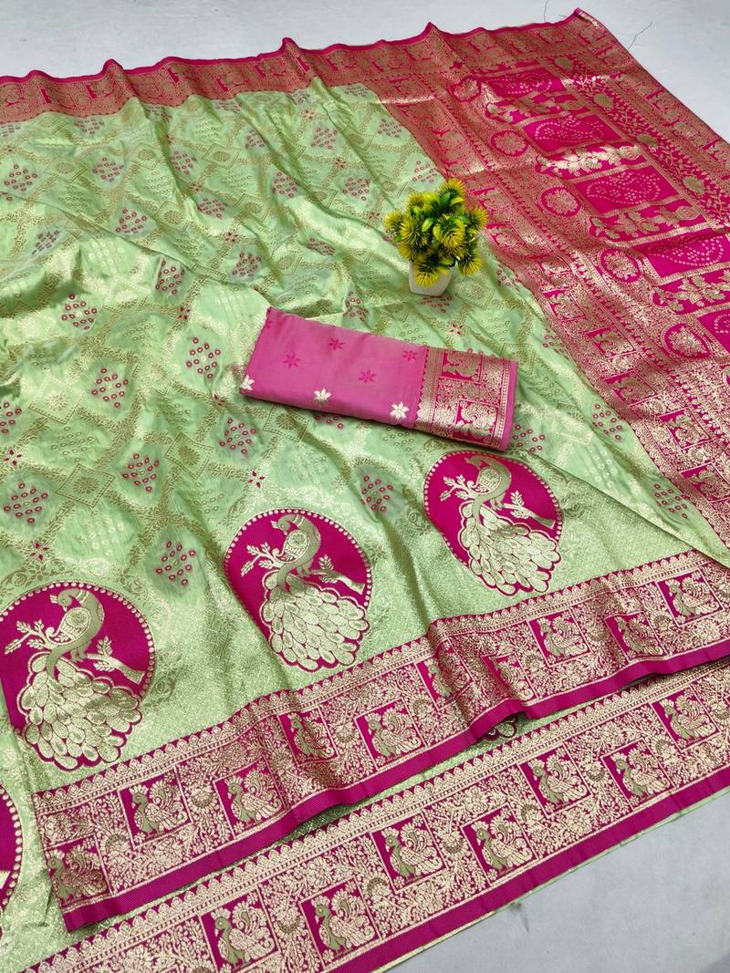 Light green zari woven banarasi silk blend saree with blouse piece