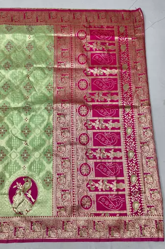 Light green zari woven silk blend saree with blouse piece
