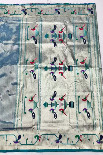 Blue zari woven paithani silk blend saree with blouse piece