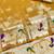 Gold zari woven paithani silk blend saree with blouse piece