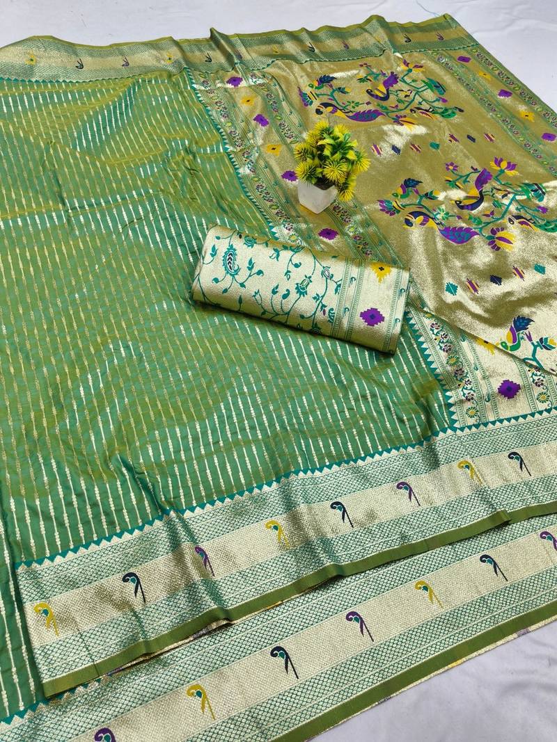 Parrot green zari woven paithani silk blend saree with blouse piece