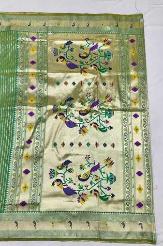 Parrot green zari woven paithani silk blend saree with blouse piece