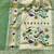Parrot green zari woven paithani silk blend saree with blouse piece