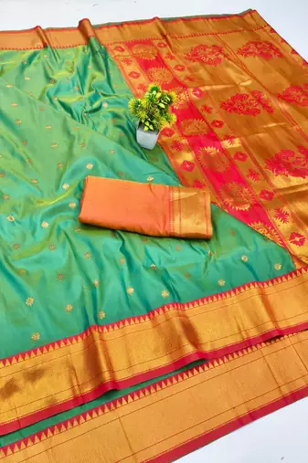Light green zari woven paithani silk blend saree with blouse piece