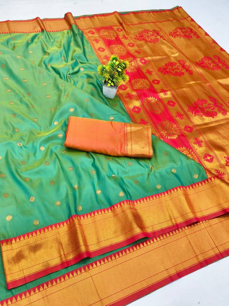 Light green zari woven paithani silk blend saree with blouse piece