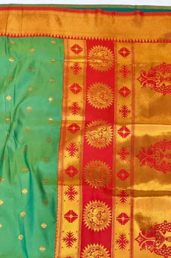 Light green zari woven paithani silk blend saree with blouse piece