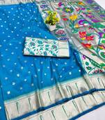 Blue zari woven paithani silk blend saree with blouse piece