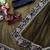 olive sequance and zari embroidery with fancy lace border silk saree