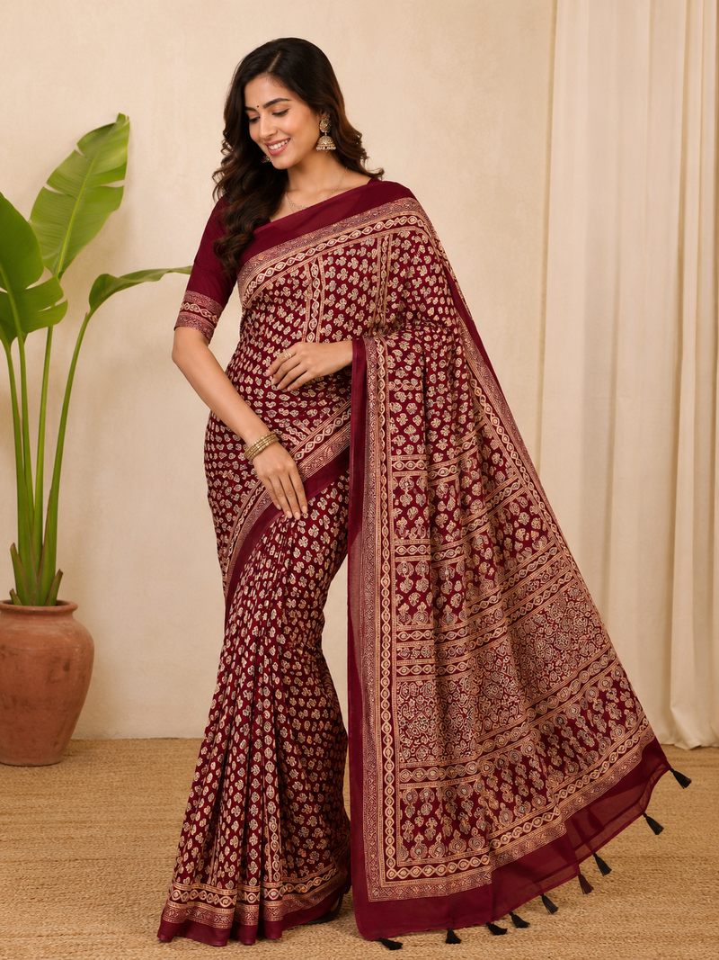 red ajarakh print with mirror and beautiful tussle crepe silk saree