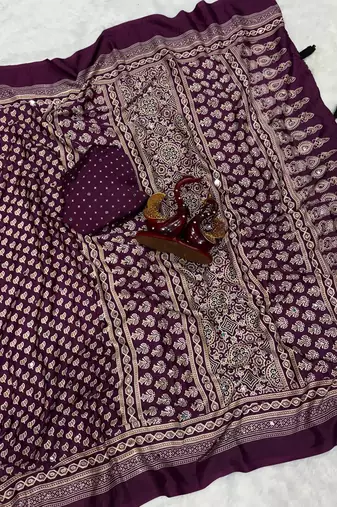 plum ajarakh print with mirror and beautiful tussle crepe silk saree