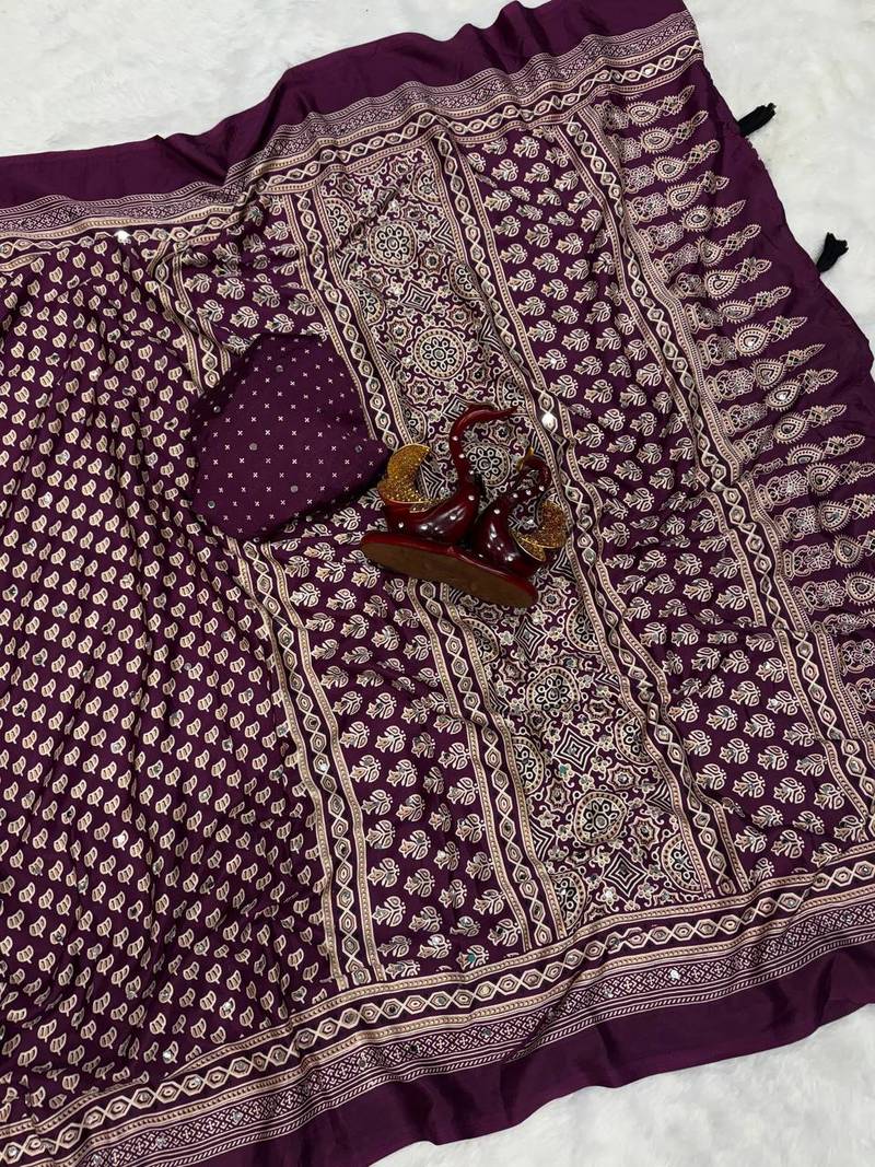 plum ajarakh print with mirror and beautiful tussle crepe silk saree