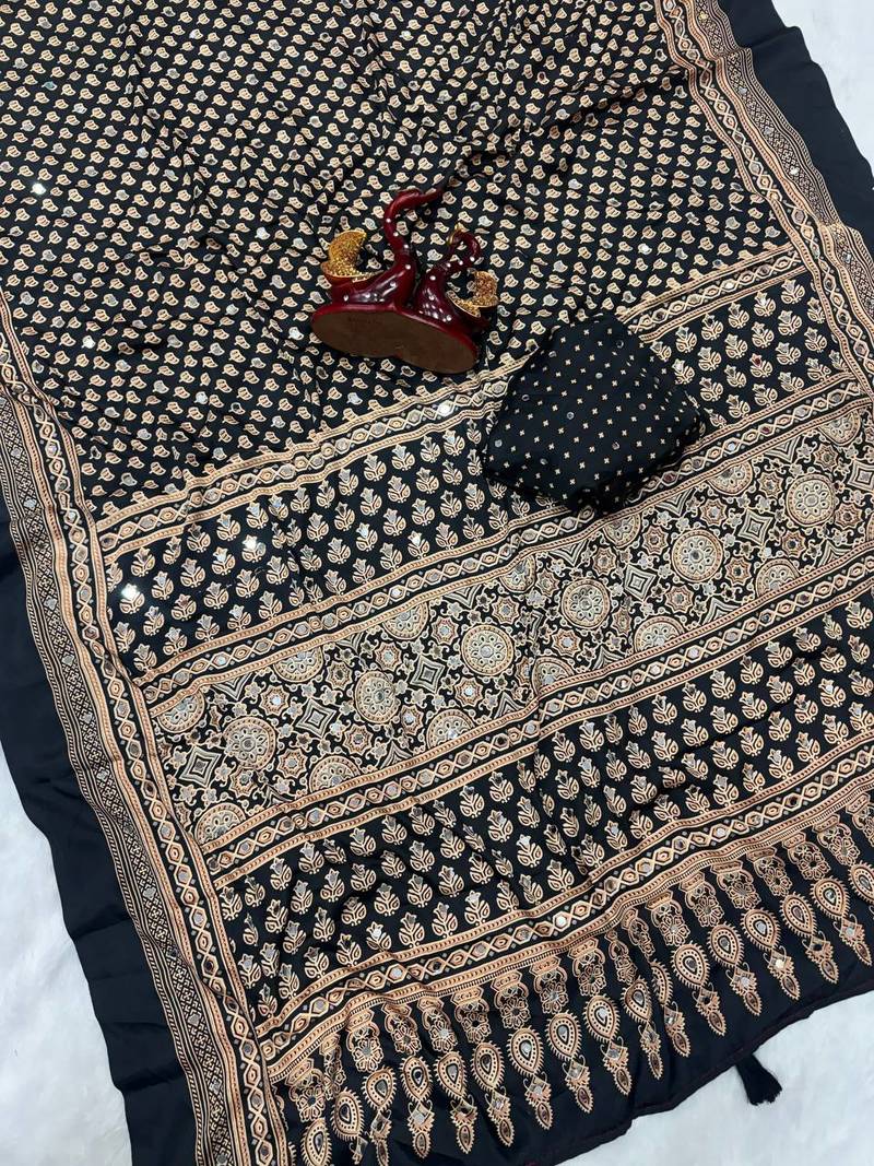 black ajarakh print with mirror and beautiful tussle crepe silk saree