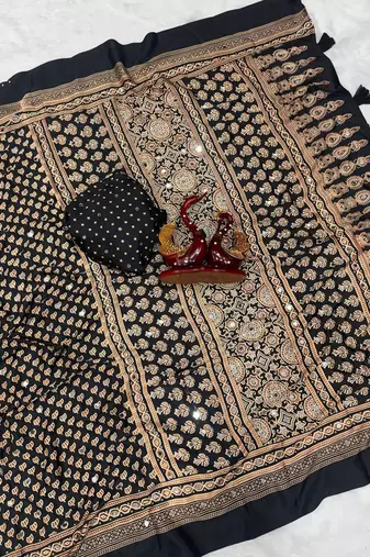 black ajarakh print with mirror and beautiful tussle crepe silk saree