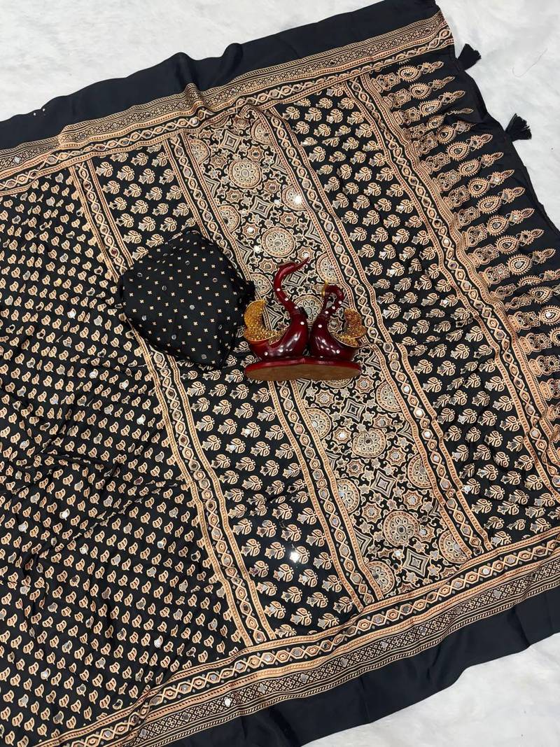 black ajarakh print with mirror and beautiful tussle crepe silk saree