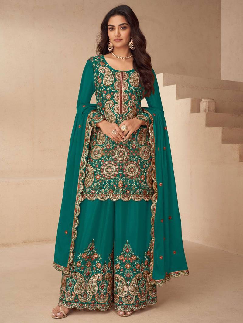 Teal green heavy embroidered in thread and zari work free size stitched straight salwar suit for women