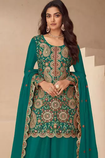 Teal green heavy embroidered in thread and zari work free size stitched straight salwar suit for women