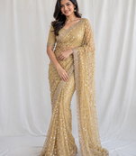 golden sequins and beads embroidery with soft net saree