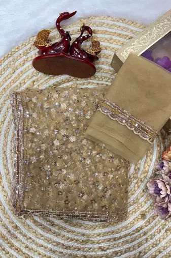 golden sequins and beads embroidery with soft net saree