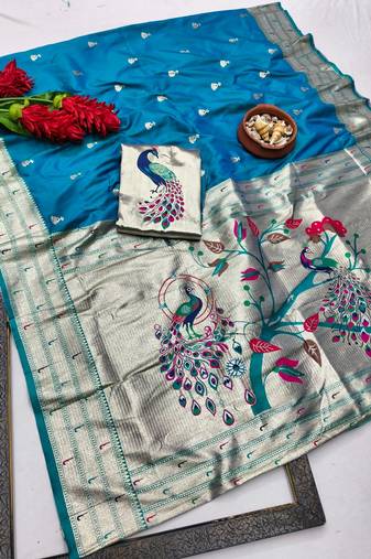 Blue zari woven paithani silk blend saree with blouse piece