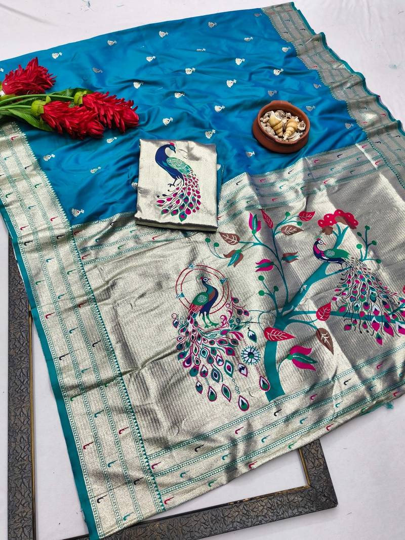 Blue zari woven paithani silk blend saree with blouse piece