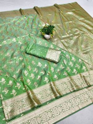 Green zari woven silk blend saree with blouse piece 1
