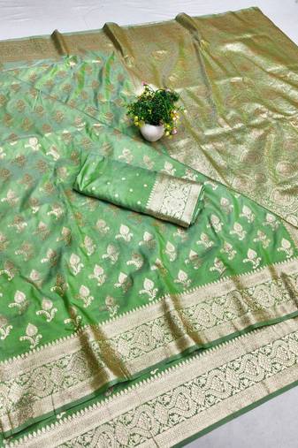 Green zari woven banarasi silk blend saree with blouse piece