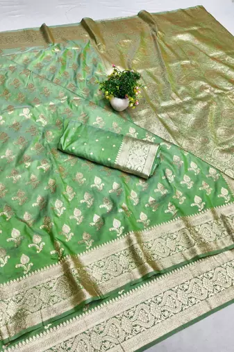 Green zari woven banarasi silk blend saree with blouse piece