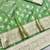 Green zari woven banarasi silk blend saree with blouse piece