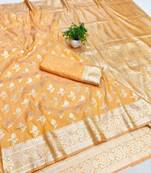 Orange zari woven banarasi silk blend saree with blouse piece
