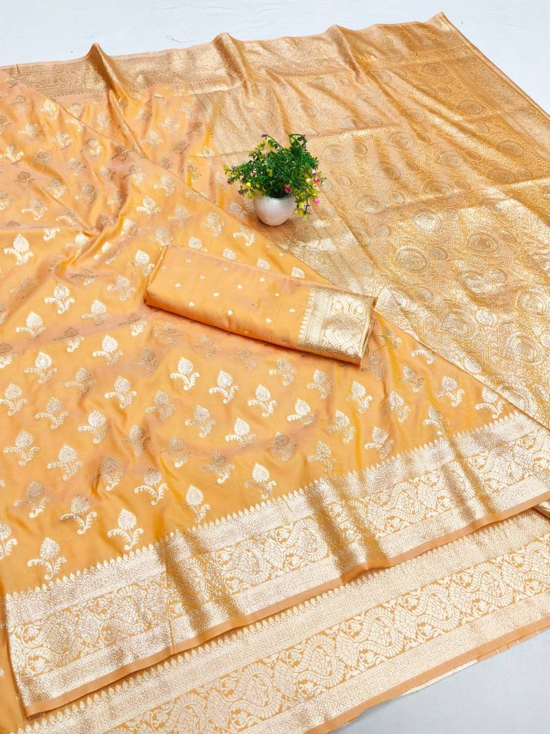 Orange zari woven banarasi silk blend saree with blouse piece