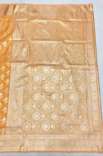 Orange zari woven silk blend saree with blouse piece