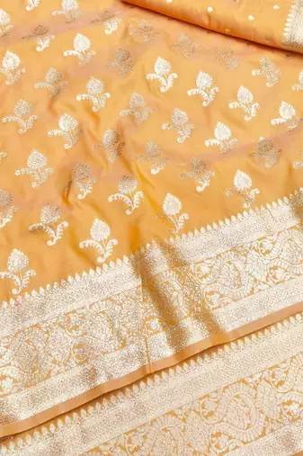 Orange zari woven silk blend saree with blouse piece