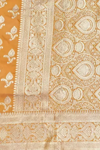 Orange zari woven silk blend saree with blouse piece